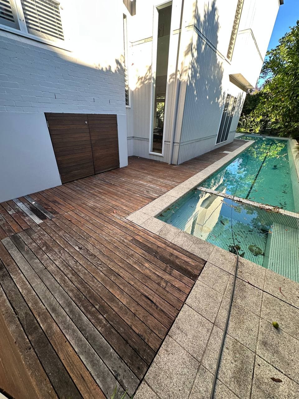 Weathered deck before restoration